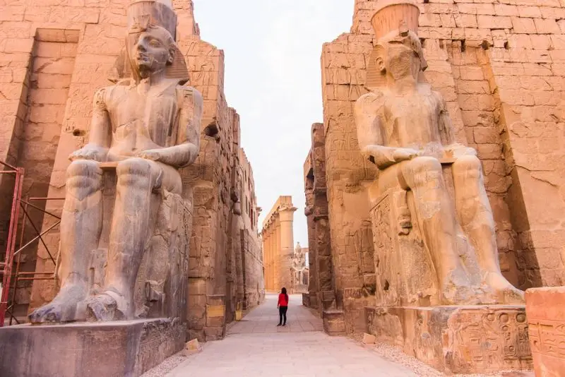 Monumental seated statues at a temple entrance in Luxor